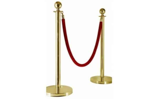 gold barrier post red rope